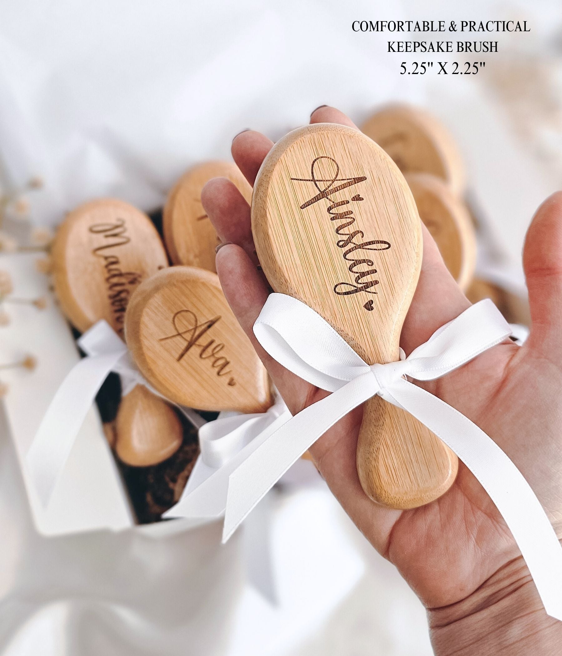 Girls birthday party favor bag with bamboo hair brush engraved with the name Clara