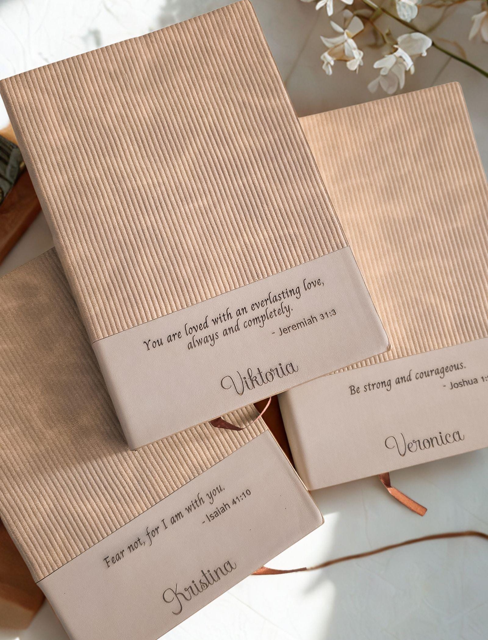Personalized Bible verse journal with neutral ribbed cover and engraved name on the front