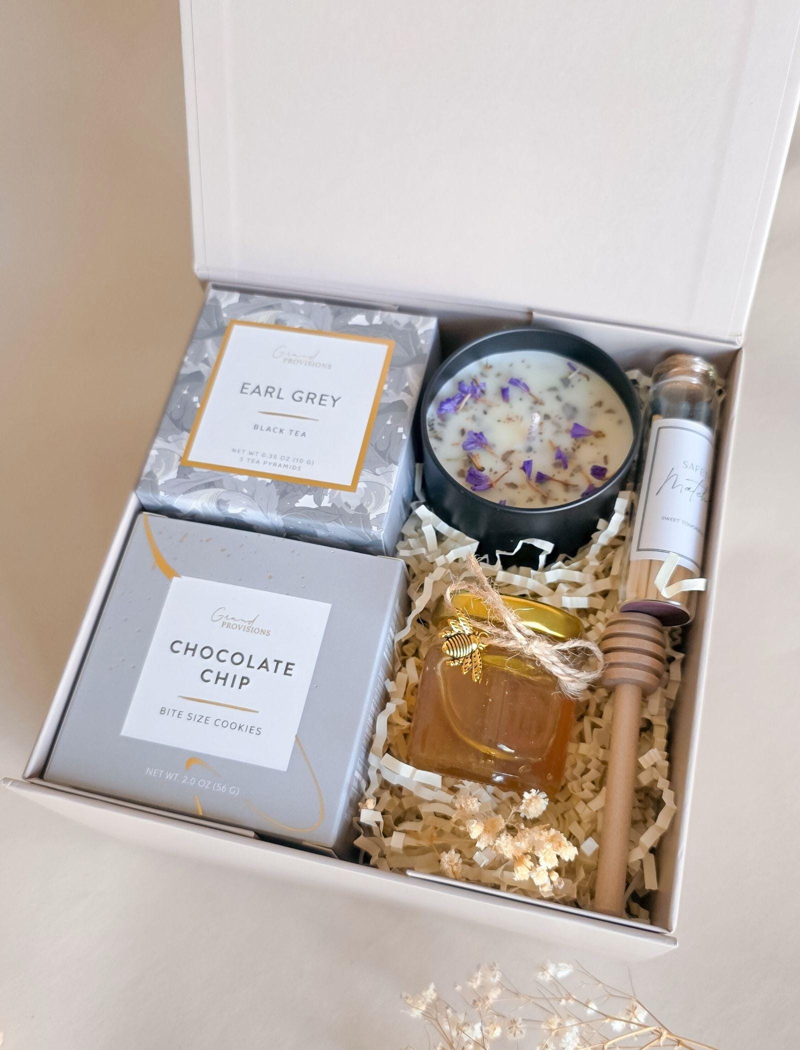 Get well soon care package with earl grey tea honey cookies and candle