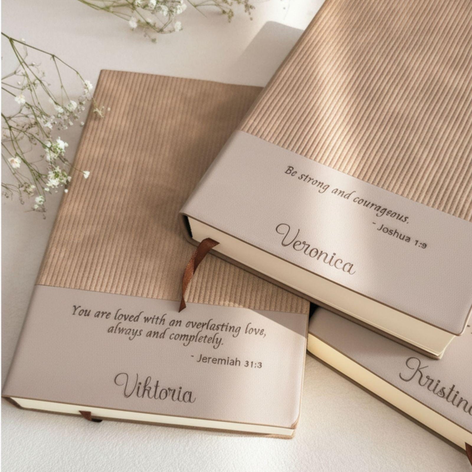 Close up of engraved Scripture and personalized name on faux leather faith journal cover