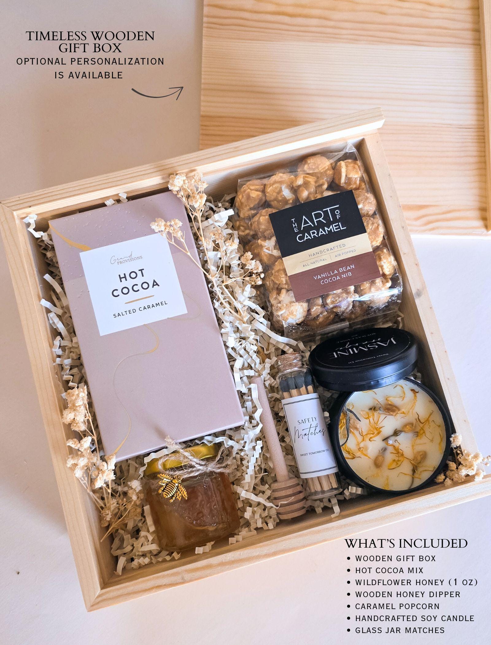 Cozy care package gift box with gourmet treats and relaxing spa touches, neutral wood box