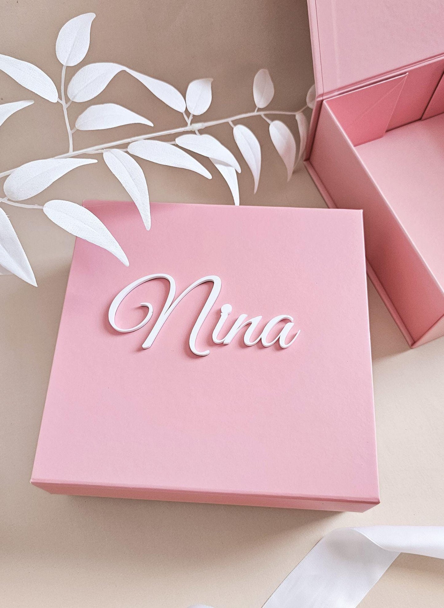 Pink keepsake gift box with bow symbol for bridesmaid proposal