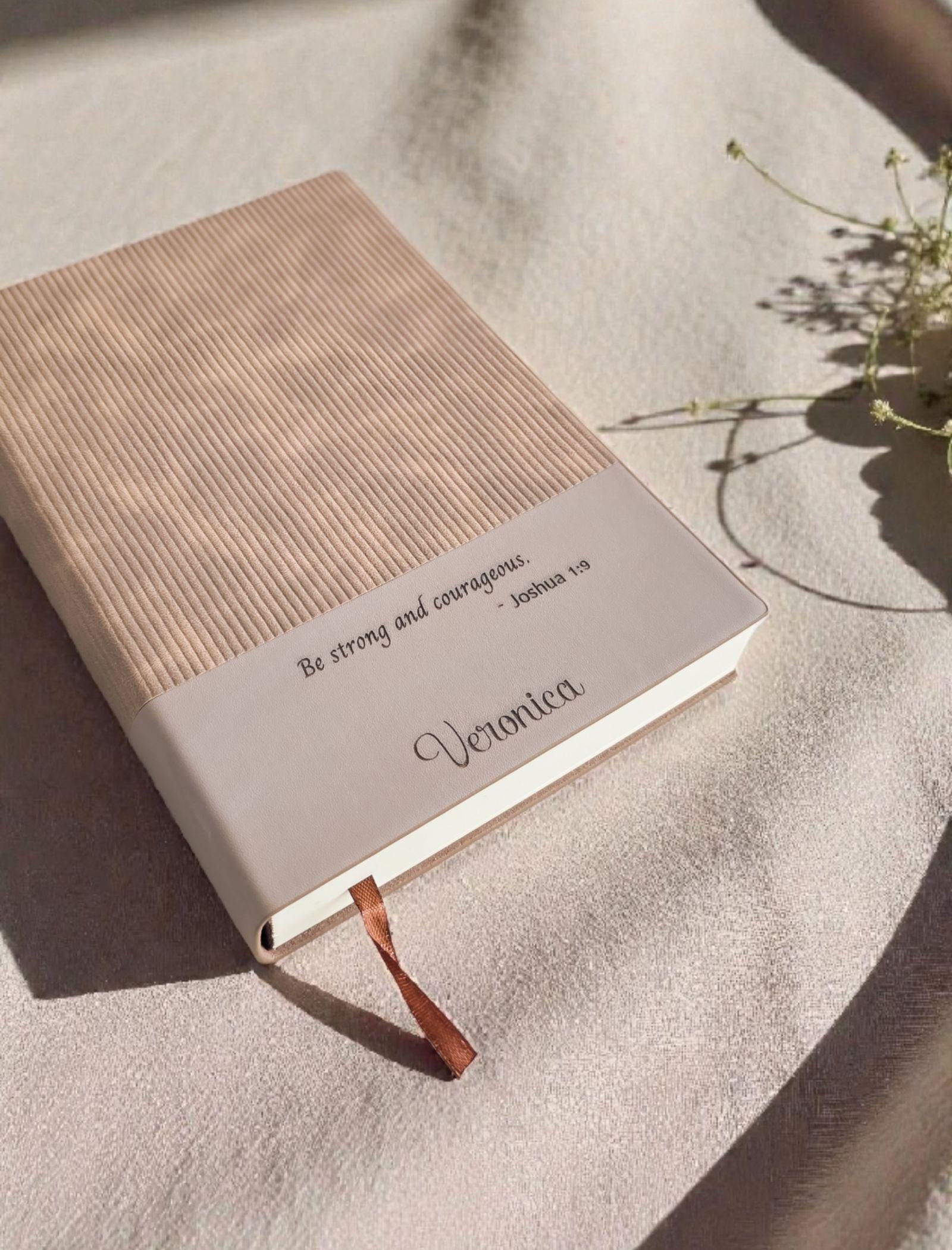 Engraved Christian journal gift featuring a Bible verse quote and custom name on the cover band