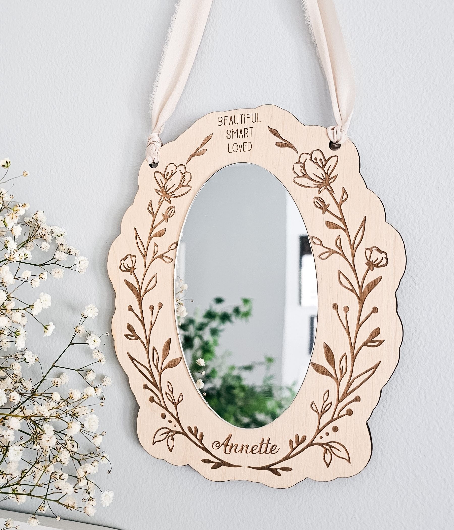 Lightweight personalized wall mirror made from birch plywood with a round center mirror