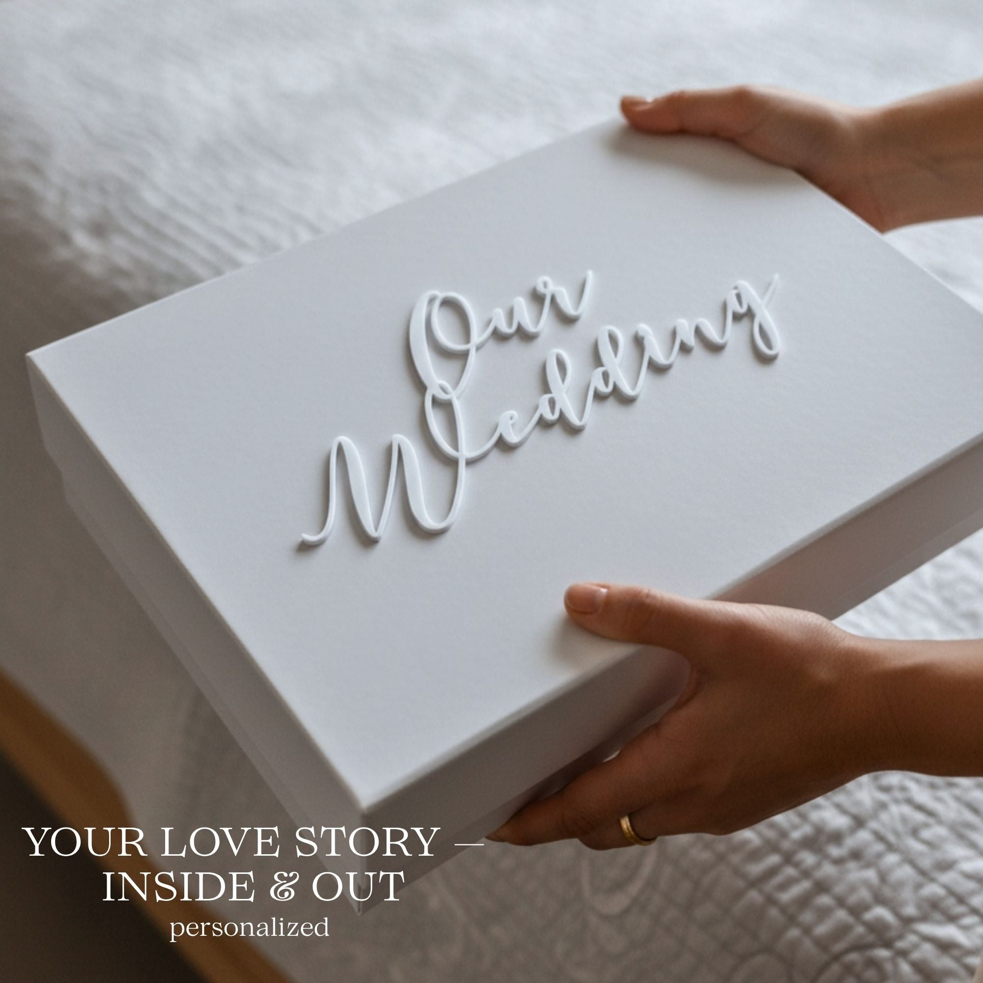 White magnetic wedding memory box with raised acrylic Our Wedding wording on the lid