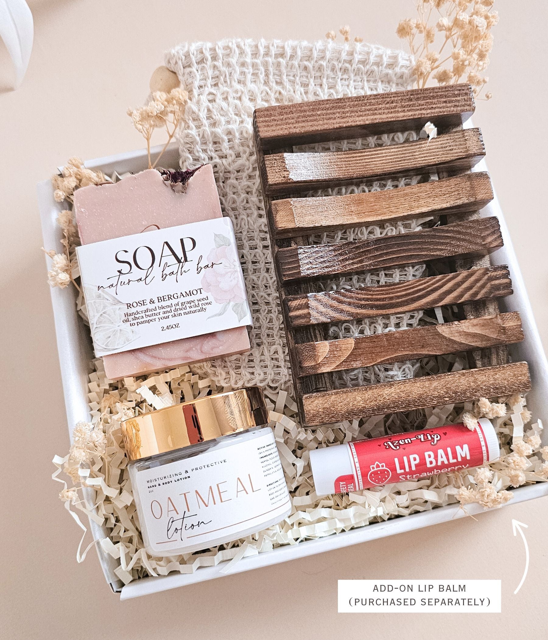 Minimalist self care gift box with natural body care essentials and wooden soap holder for everyday rituals