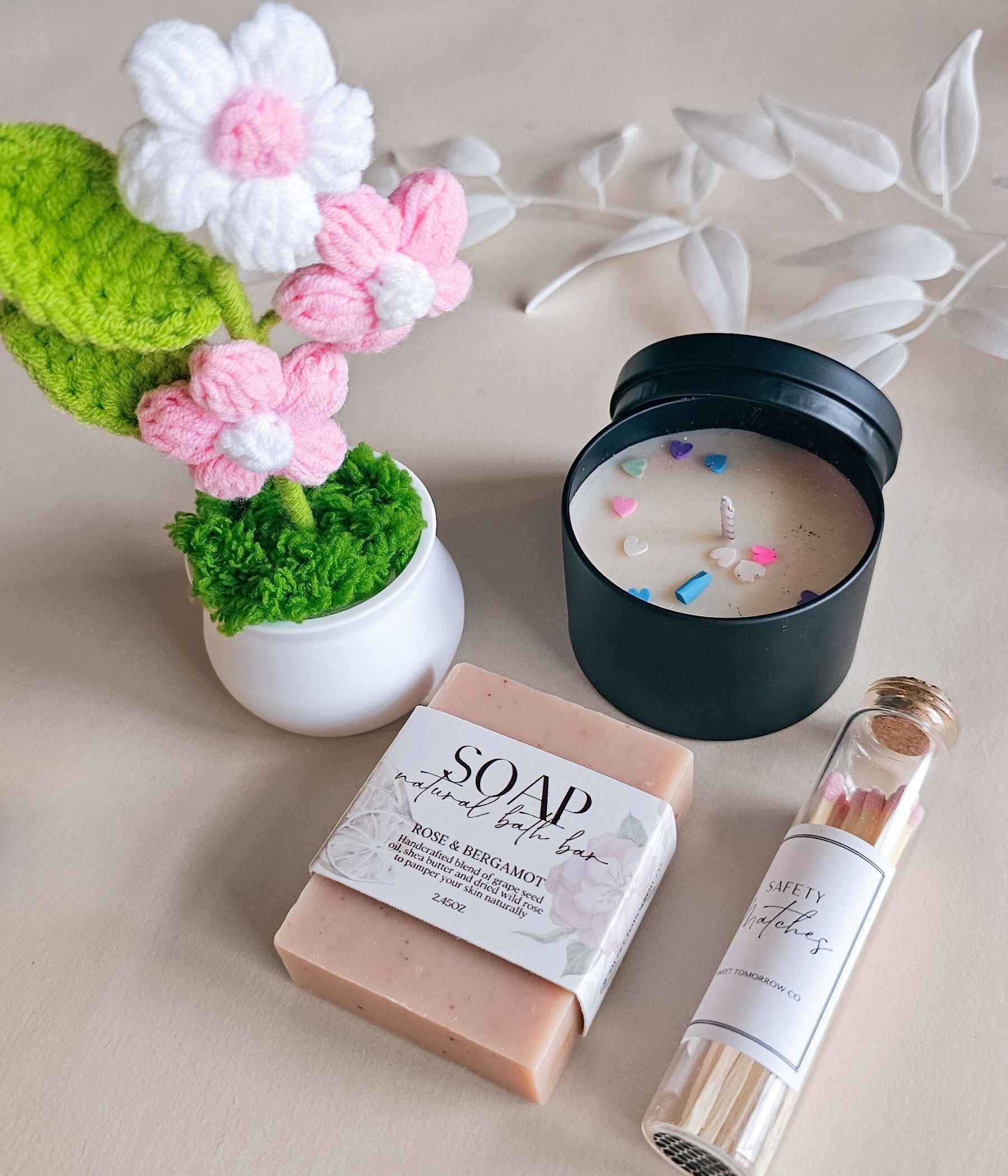 Uplifting coworker appreciation care package featuring candle, soap, and handmade crochet bouquet in gift-ready box