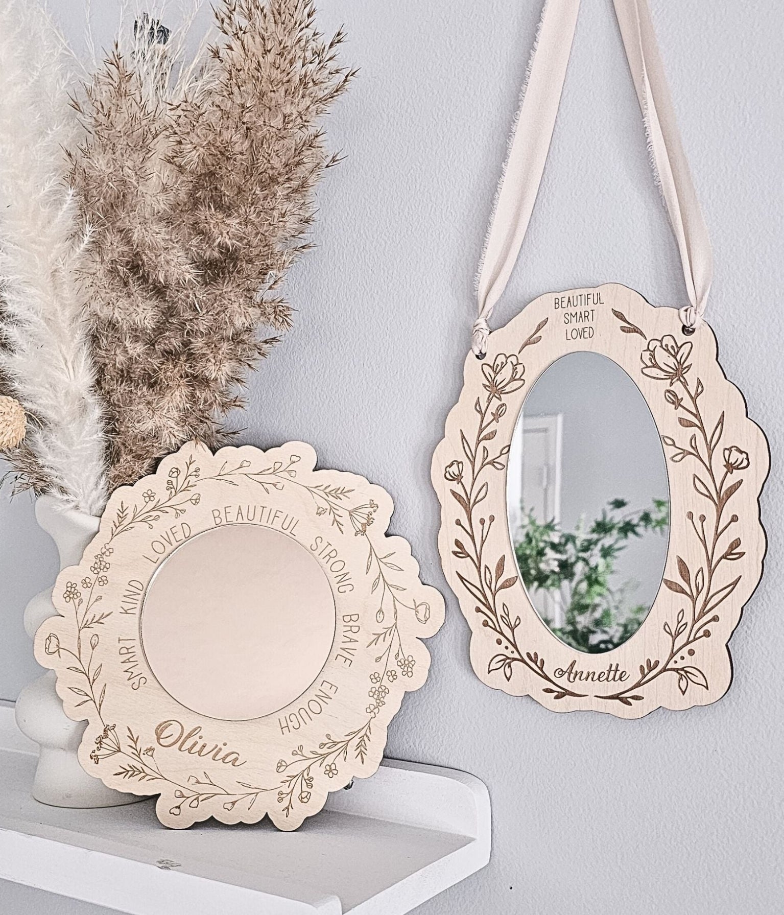 Custom wooden affirmation mirror for a child’s room shown in the round shape design