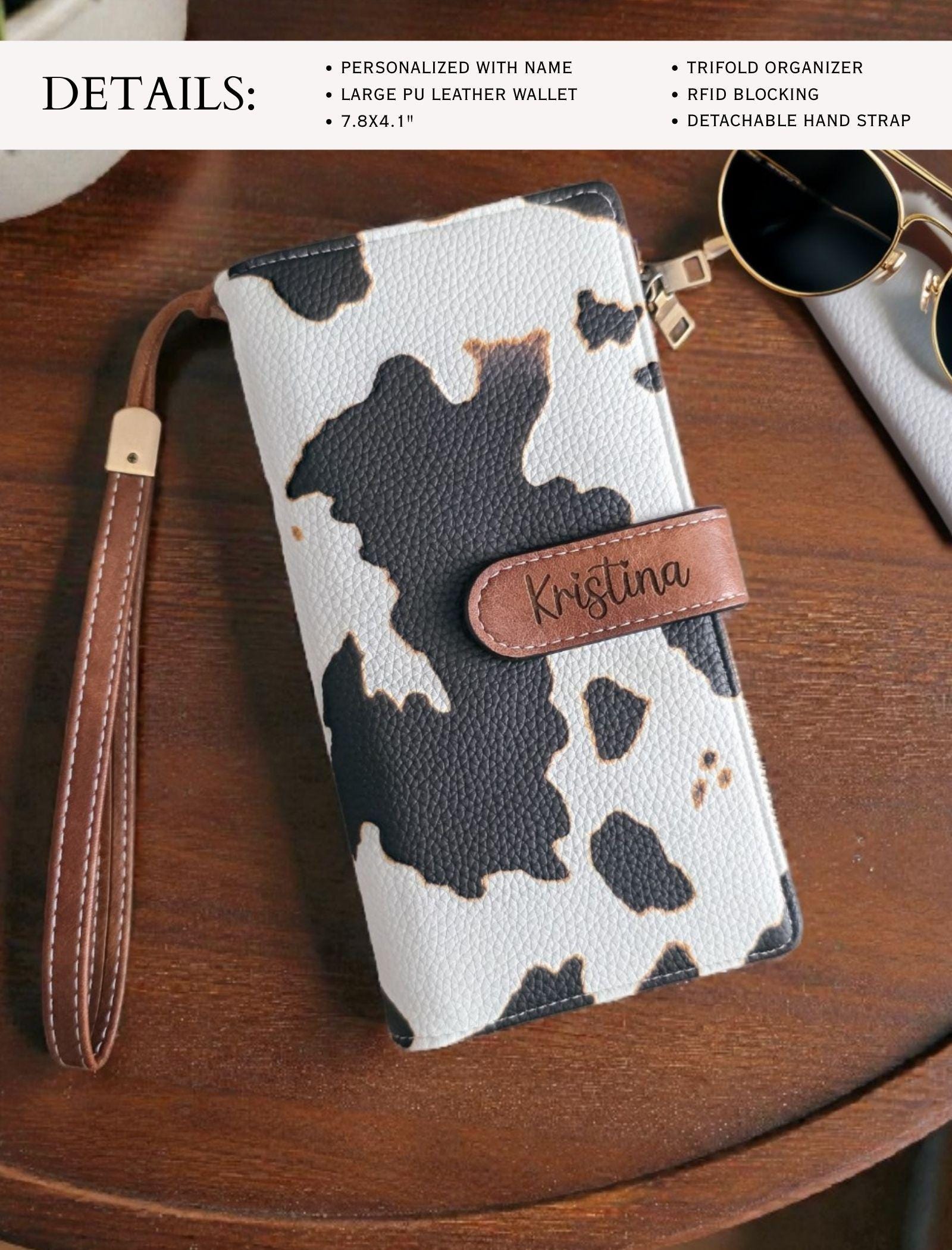 Cow print wallet wristlet personalized with engraved name on the clip and detachable strap
