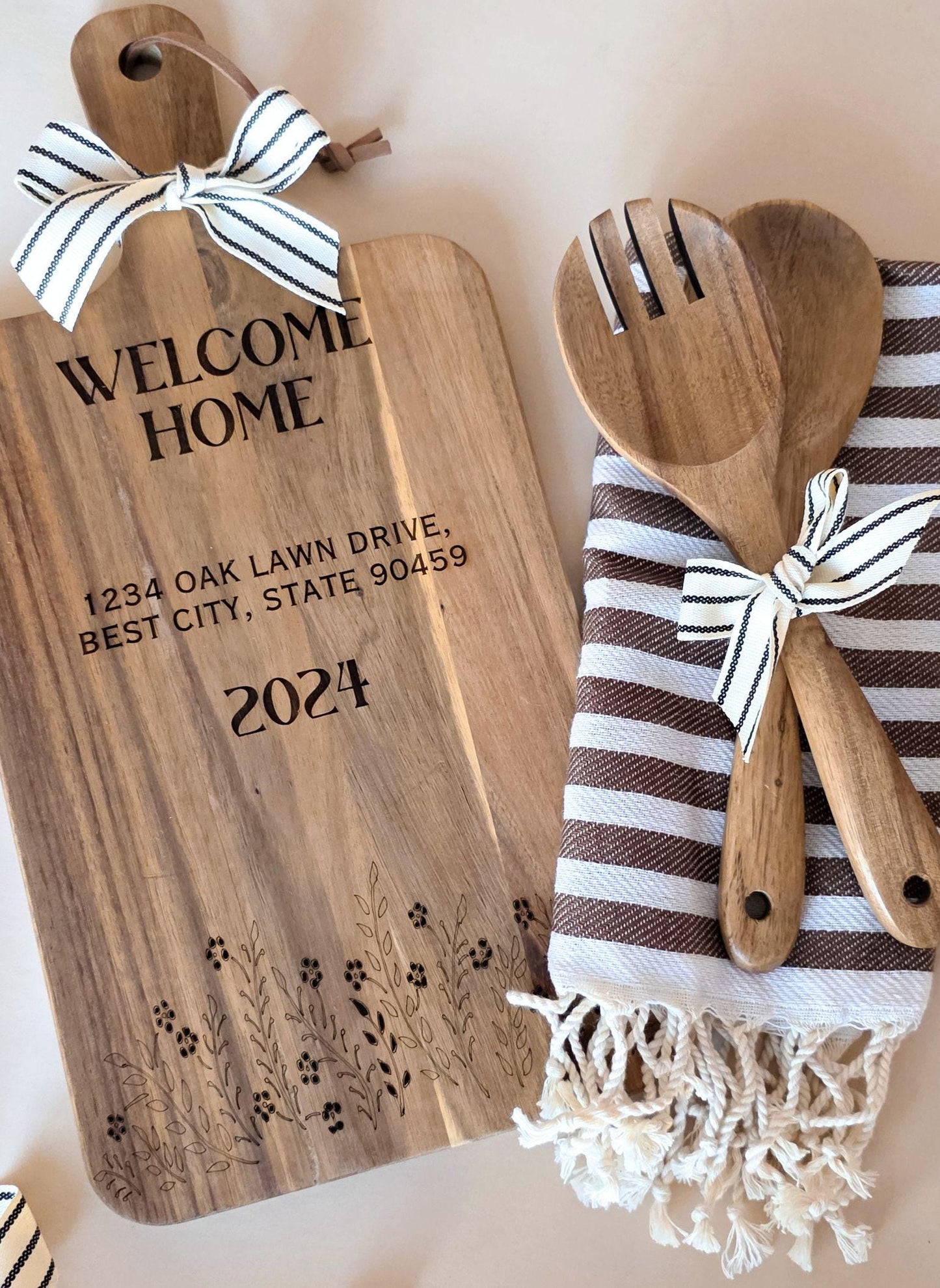 Engraved acacia cutting board with “The [Family]” and established year, personalized new home gift