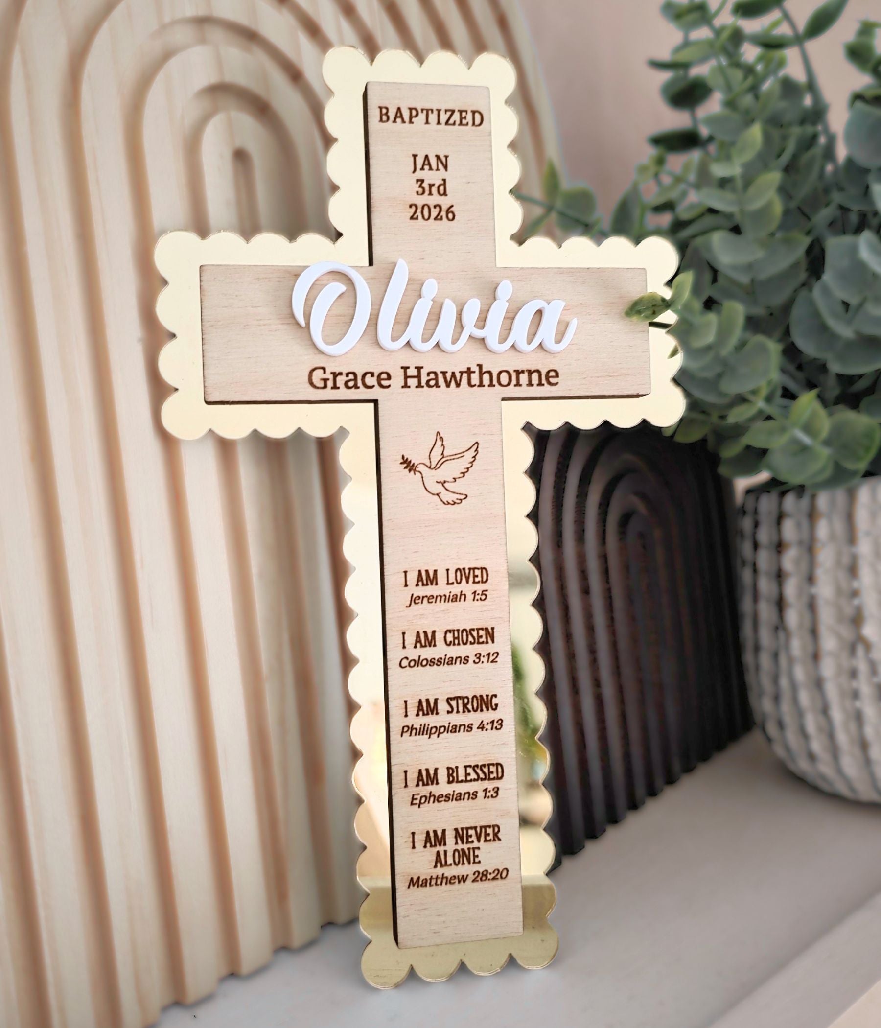 Wooden christening cross with raised acrylic name, engraved date, dove detail, and mirror acrylic accent