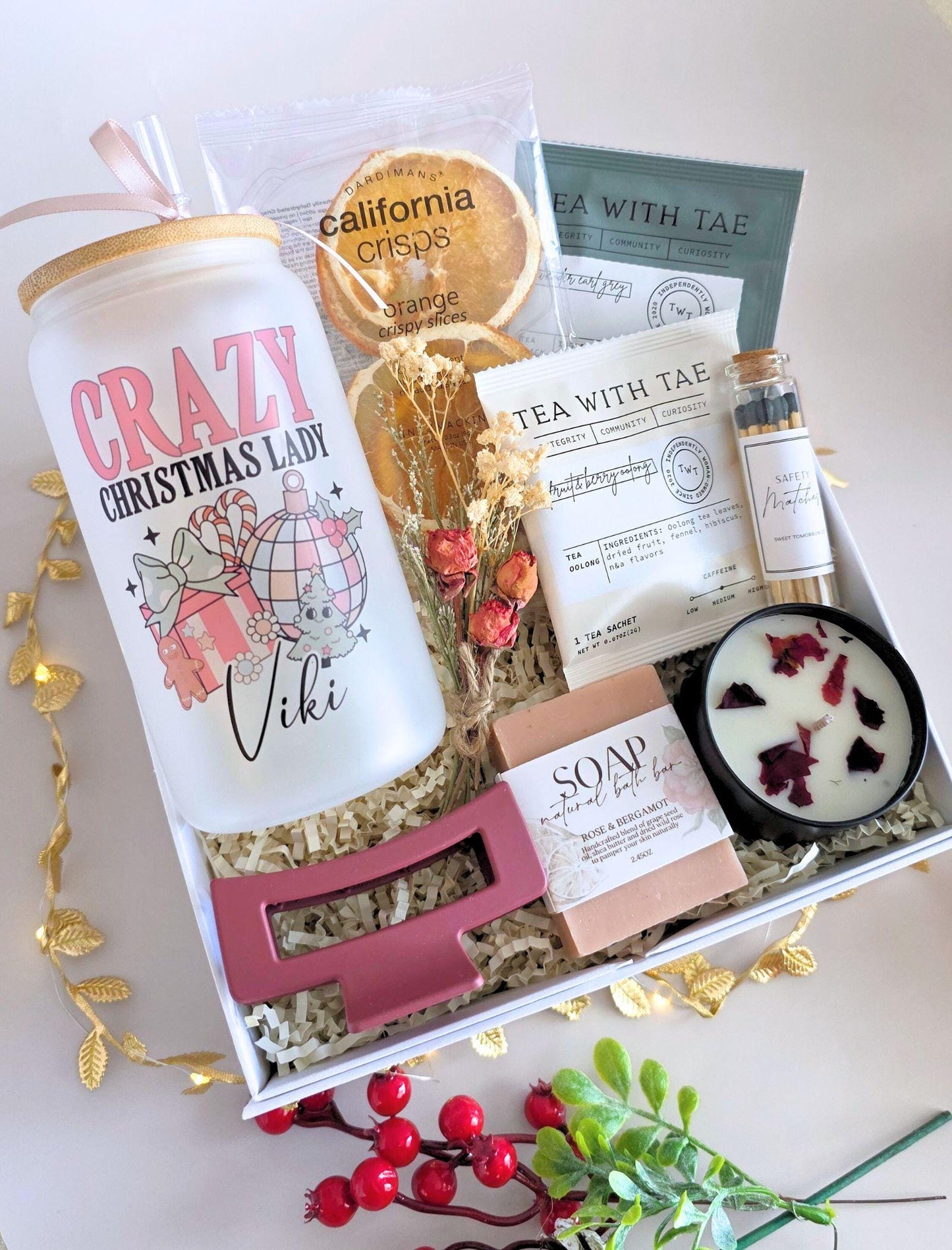 Holiday gift box with festive self-care items in white keepsake packaging, cozy Christmas present for her