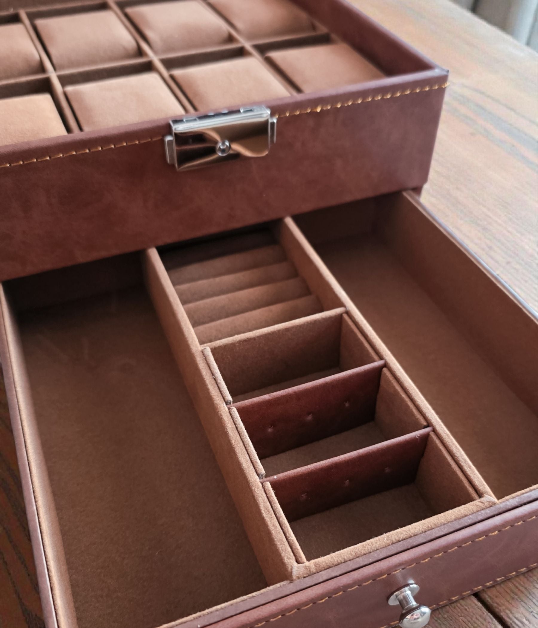 Brown leatherette watch storage box with compartments and lockable closure shown with personalized lid