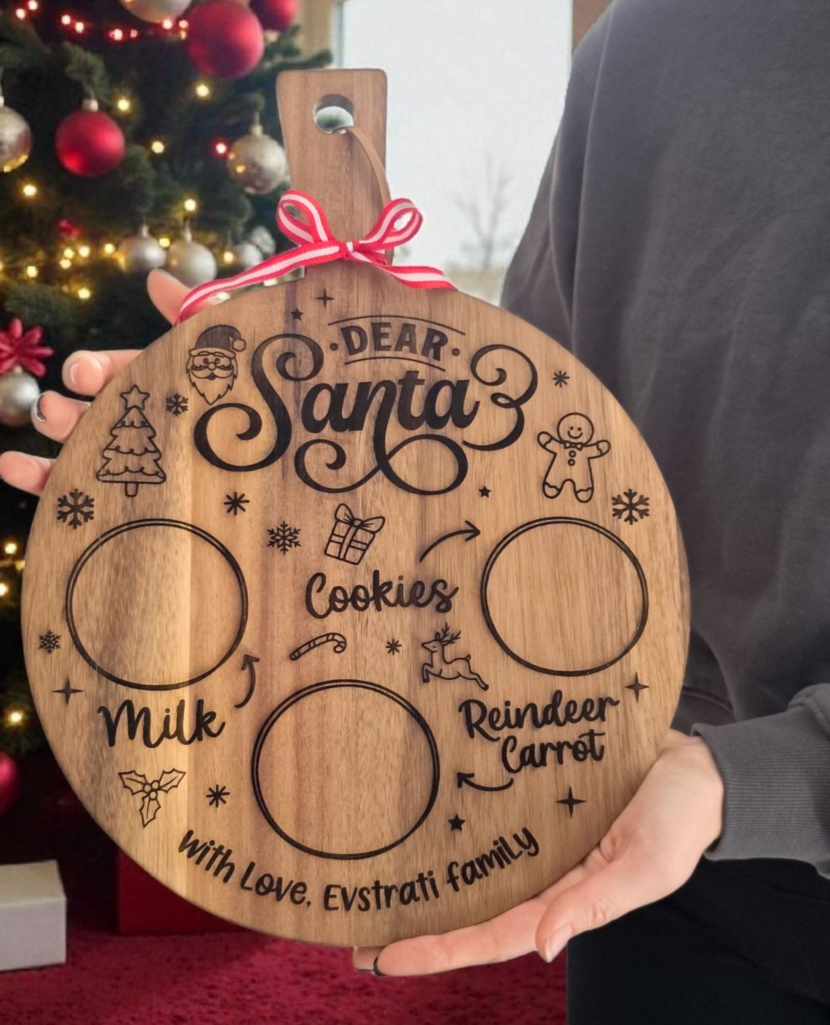 Round Santa treat board with handle, laser-etched with Dear Santa and marked places for cookies, milk, and reindeer carrots, measuring 15.8 by 11.8 inches