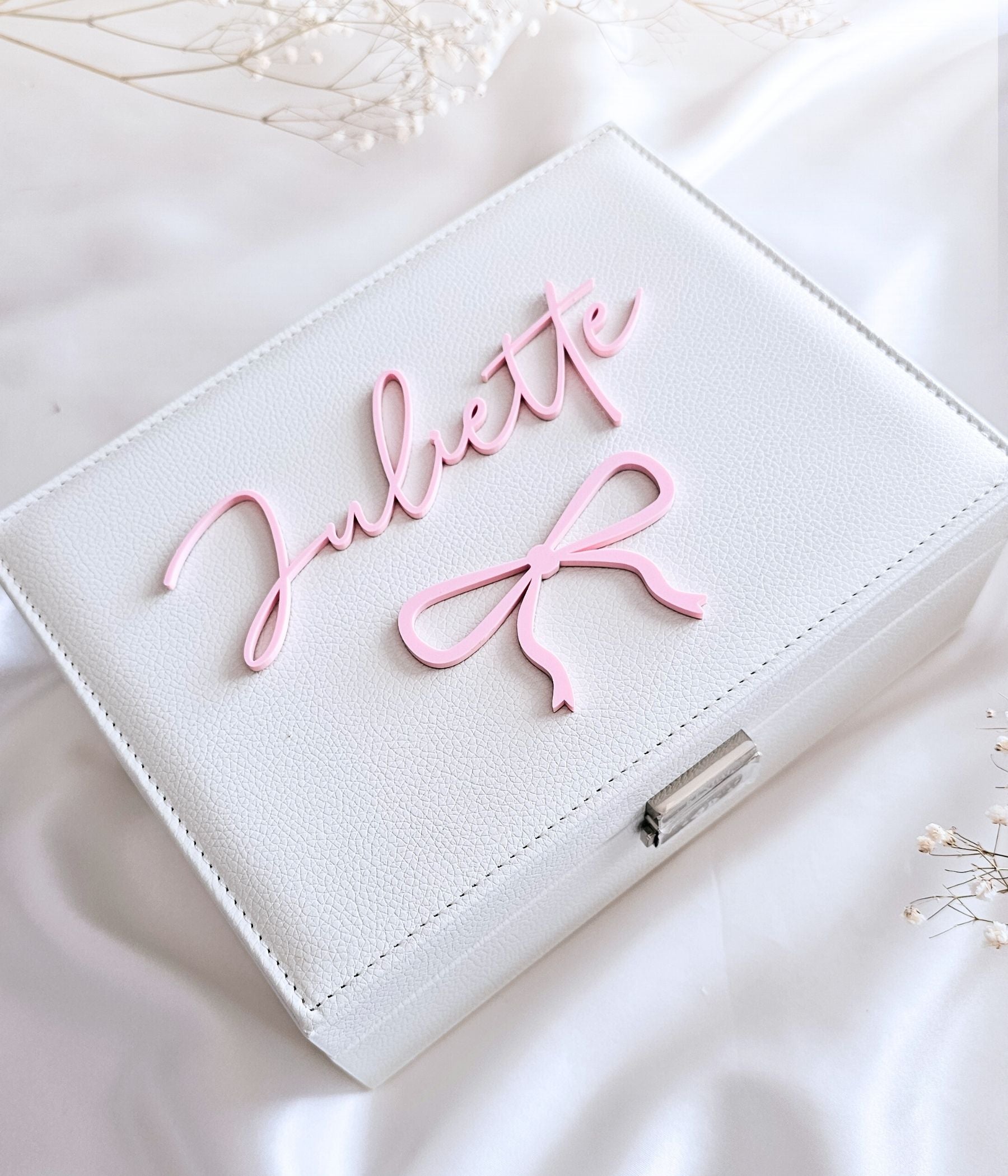 Personalized white jewelry box with pink acrylic name on lid