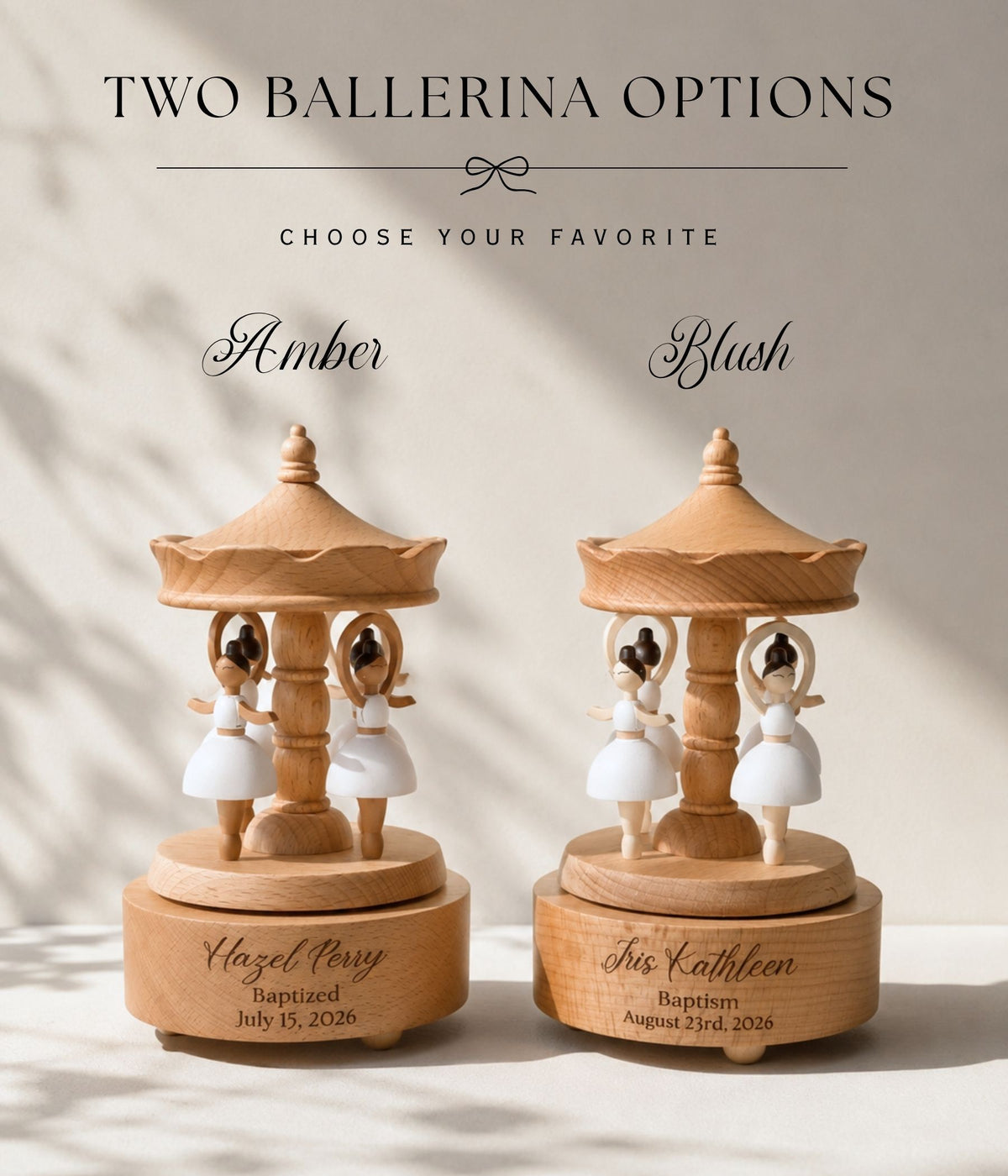 Two personalized wooden ballerina keepsakes shown side by side under the heading 'TWO BALLERINA OPTIONS' with color names 'Amber' and 'Blush'. Each keepsake features a small wooden carousel-style tower with two white-dressed ballerina figures and a round engraved base.